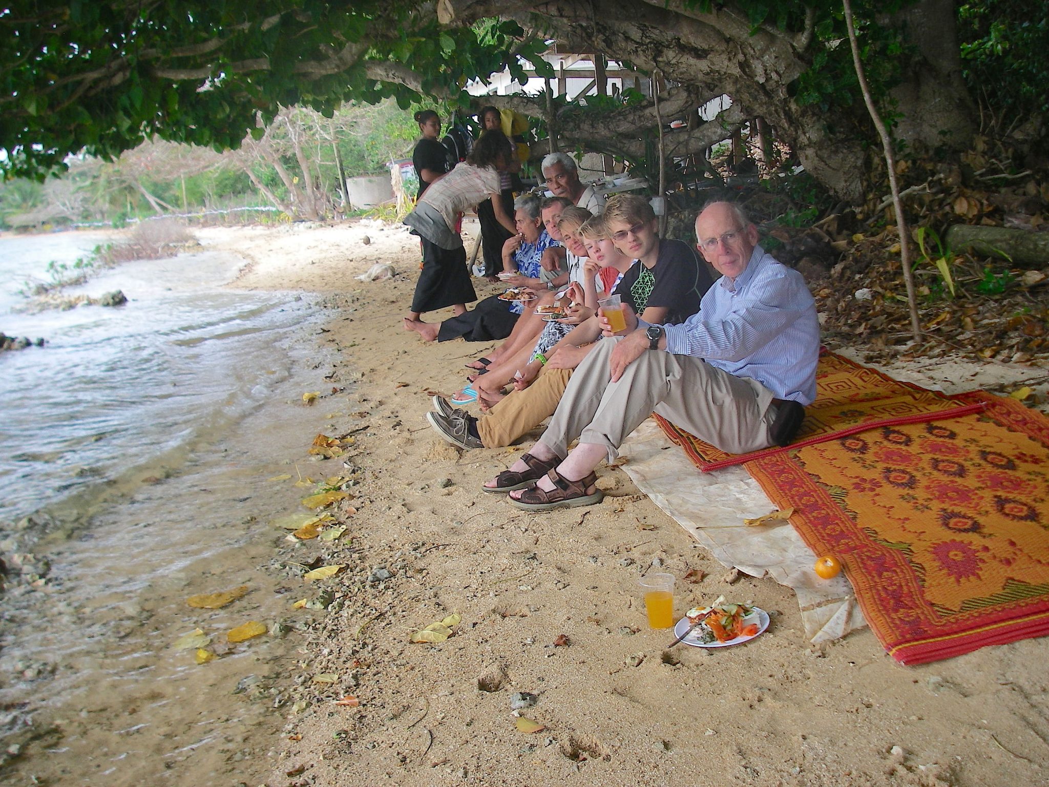 44. A kind Tongan family we knew from the school where I gave the art lesson invited us and another sailing missionary family to their home for a traditional Tongan feast. Whales and their calves were commonly seen in front of their house.