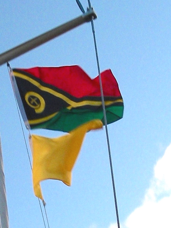 1-joyfuls-vanuatu-courtesy-and-yellow-quarantine-flags-flew-from-her-starboard-flag-halyard-as-we-approached-efate-vanuatu-she-had-to-fly-the-quarantine-flag-until-she-cleared-into-the-country-th