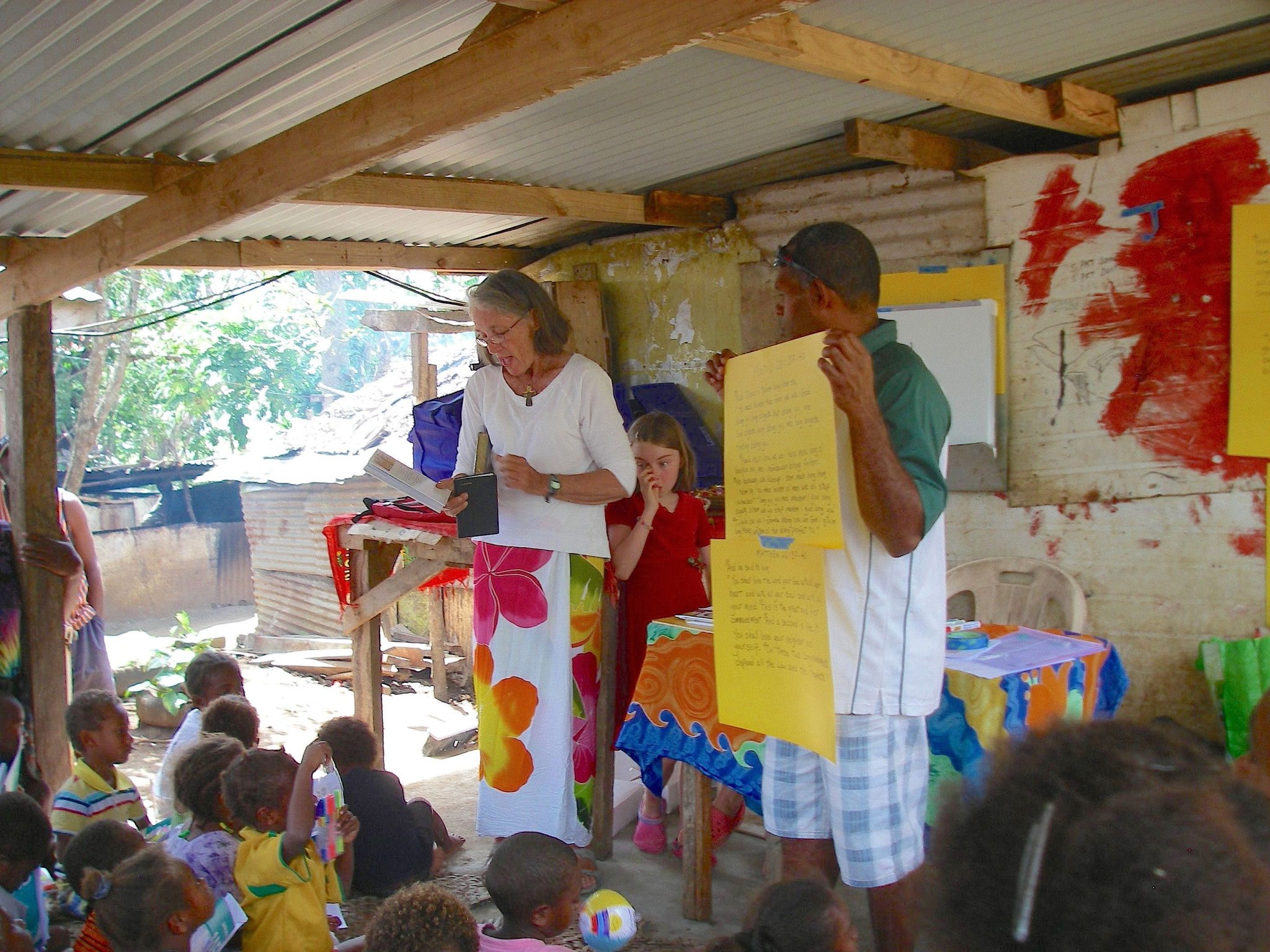 58-jeff-and-anne-donated-bibles-in-bislama-and-english-to-the-tagabe-village-willie-stood-by-to-translate-what-i-said-into-bislama-young-laura-helped-distribute-prizes-to-the-children