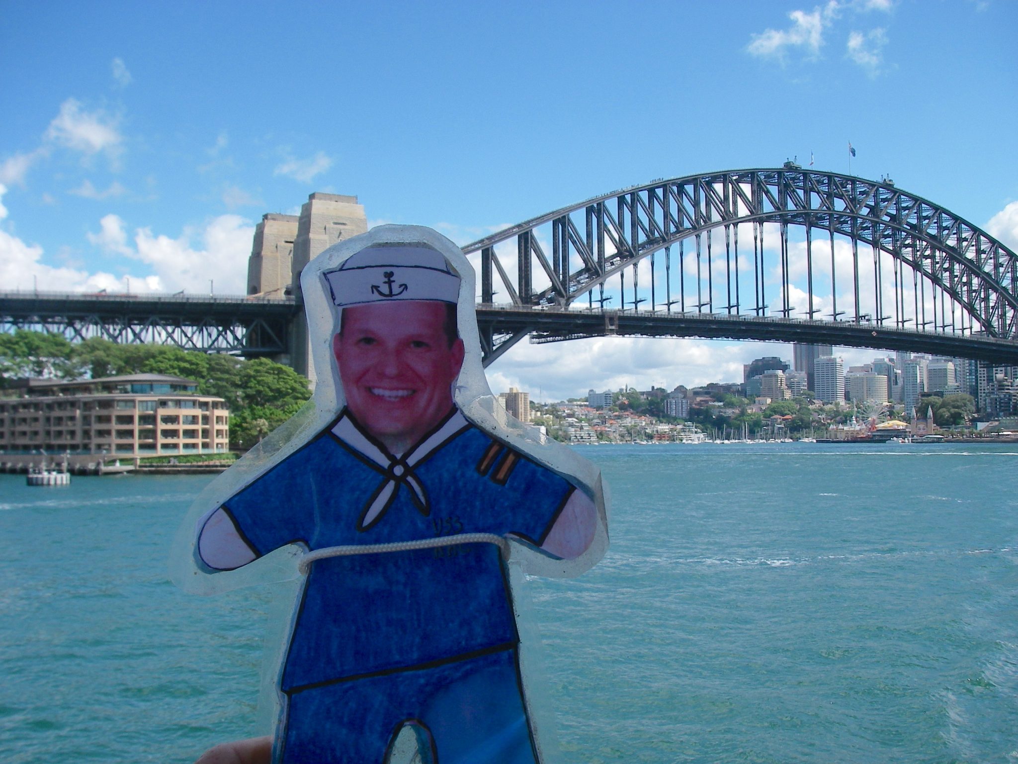100. Flat Mr. Davis saw the Sydney bridge from a ferry boat another fine day when we visited the ANZAC War Memorial in Sydney.