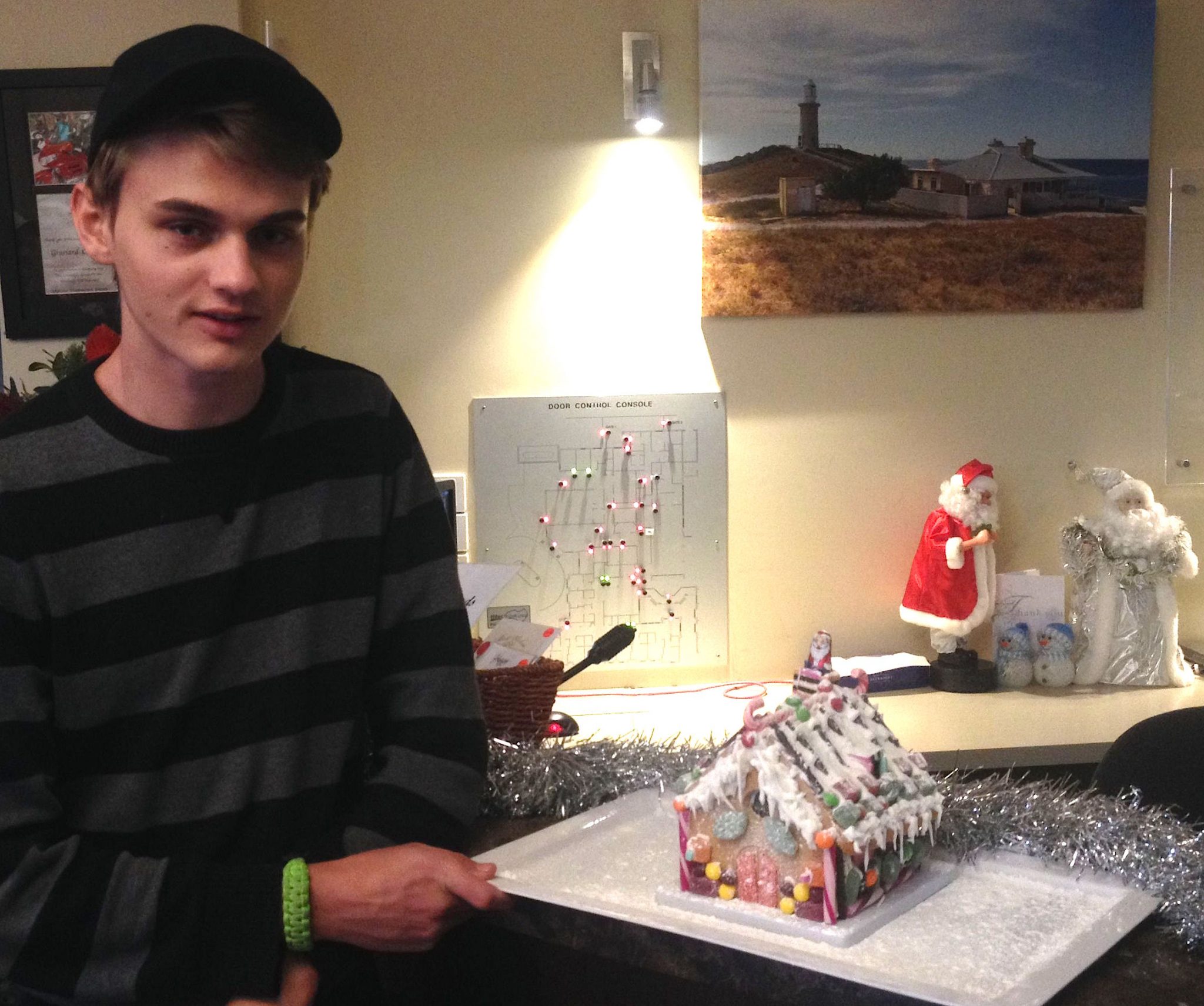 133.1. Josh and the gingerbread house he kindly made to give to residents of the elder care center on Phillip Island, Australia