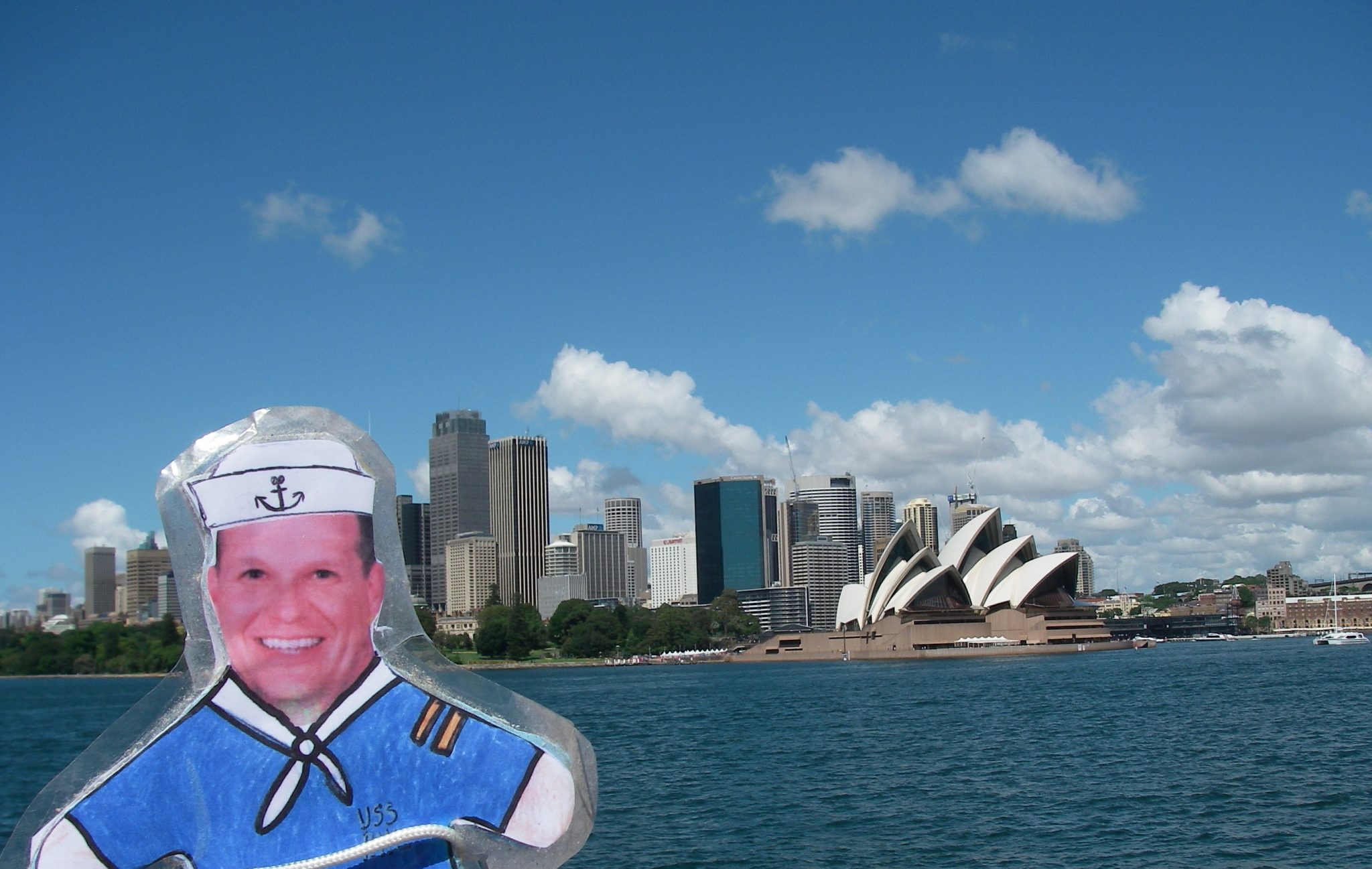 38. Flat Mr. Davis approaches Sydney from a ferry boat.